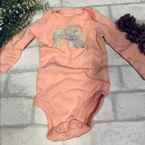 Pink and gray onesie.